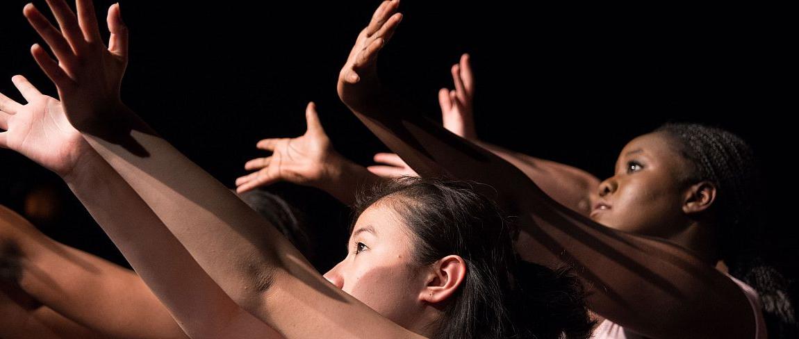 Carthage students performing in a dance production.